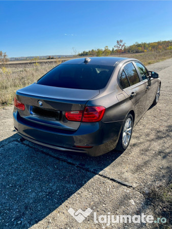Bmw 320 an 2015 masina
