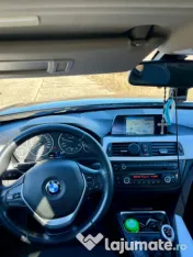 Bmw 320 an 2015 masina