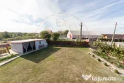 Casa cu teren generos si gradina spectaculoasa – Comuna Cu 