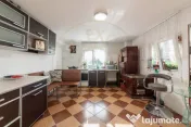 Casa cu teren generos si gradina spectaculoasa – Comuna Cu 