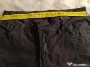 Blugi Versace în stare foarte bună 