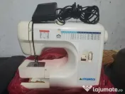 Chitara electronica cat si masina de cusut 