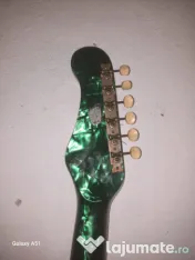 Chitara electronica cat si masina de cusut 