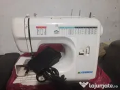 Chitara electronica cat si masina de cusut 