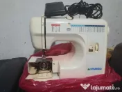 Chitara electronica cat si masina de cusut 