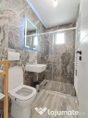 Apartament 2 cam Mobilier si finisaje moderne,parcare Eroilor Floresti 