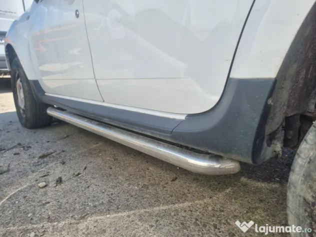 Prag stanga plastic Dacia Duster 2013