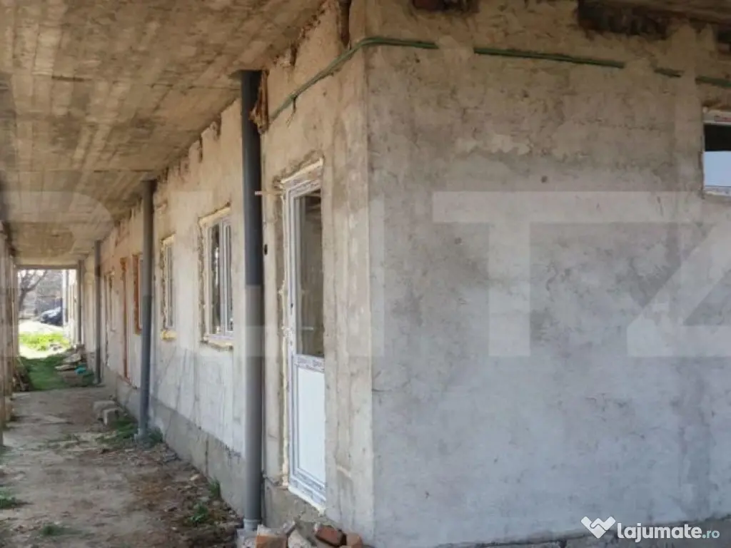 CLADIRE LA ROSU GAESTI, AFACERE