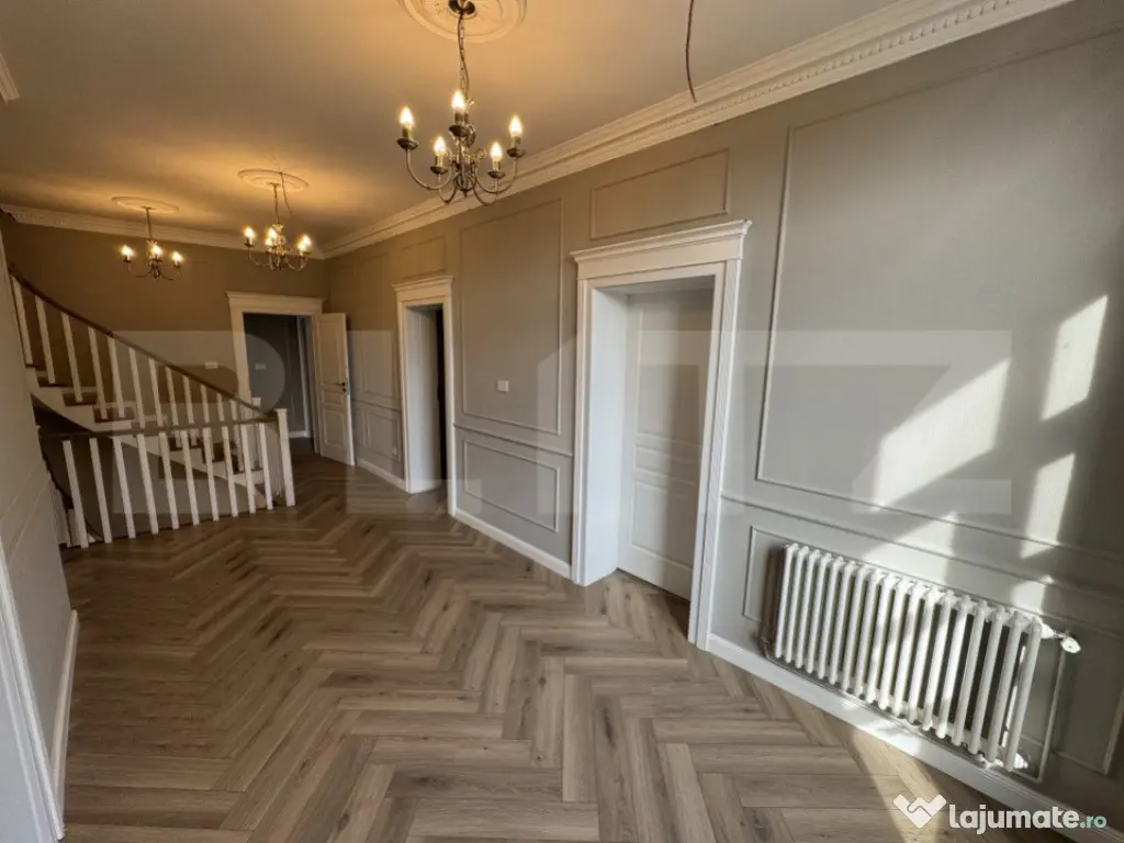 Casă tip conac S + P + E de 365 mpu, pe un teren de 1.143mp