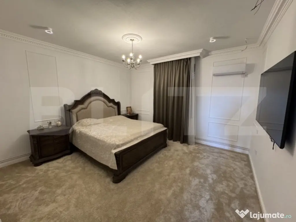 Casă tip conac S + P + E de 365 mpu, pe un teren de 1.143mp