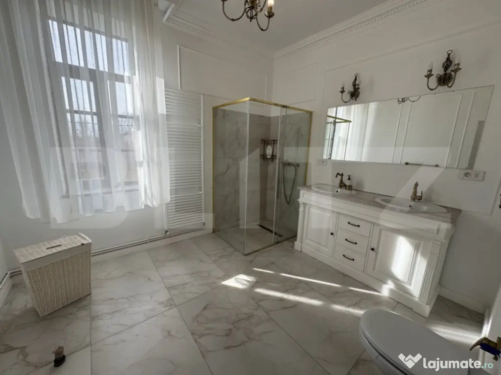 Casă tip conac S + P + E de 365 mpu, pe un teren de 1.143mp