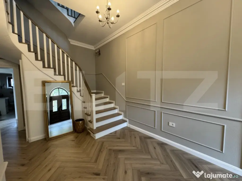 Casă tip conac S + P + E de 365 mpu, pe un teren de 1.143mp