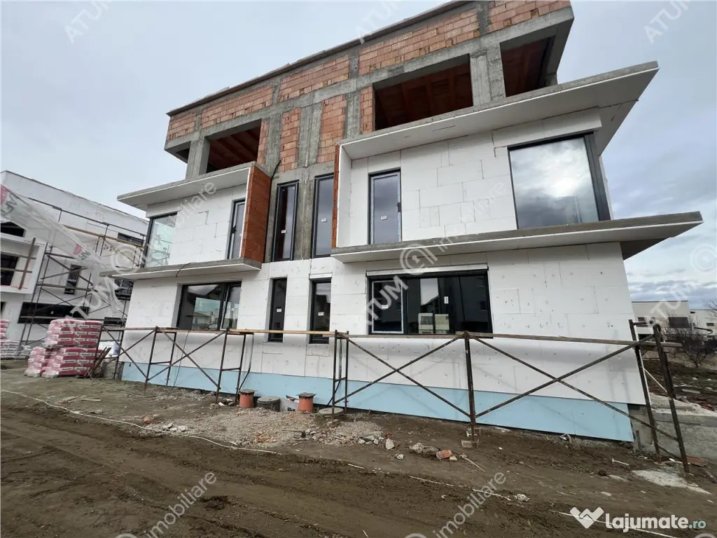 Casa moderna cu 4 camere 3 bai si teren de 214 mp zona Triaj 