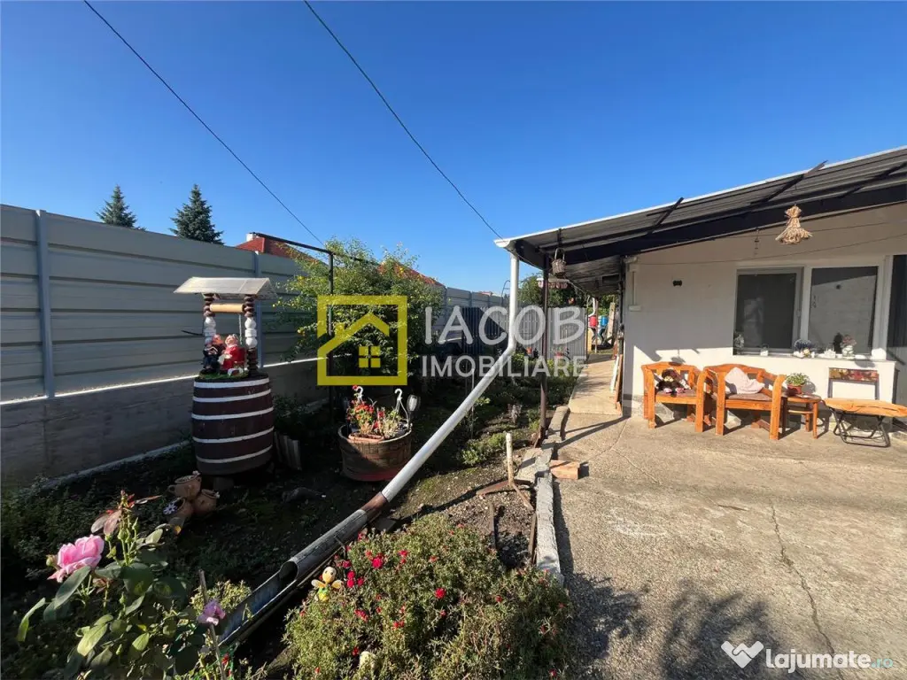 Teren intravilan 1010 mp cu casa batraneasca, magazie, beci, 