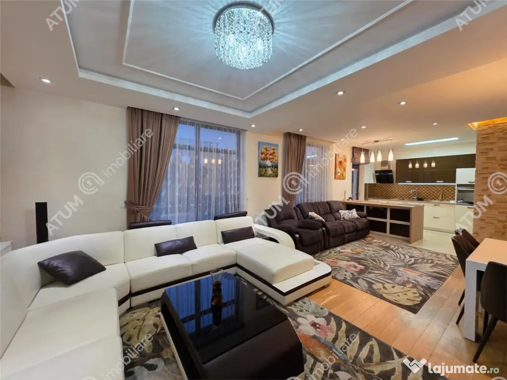 Casa 4 camere 3 bai terasa si teren 250 mp zona Octavian Gog 