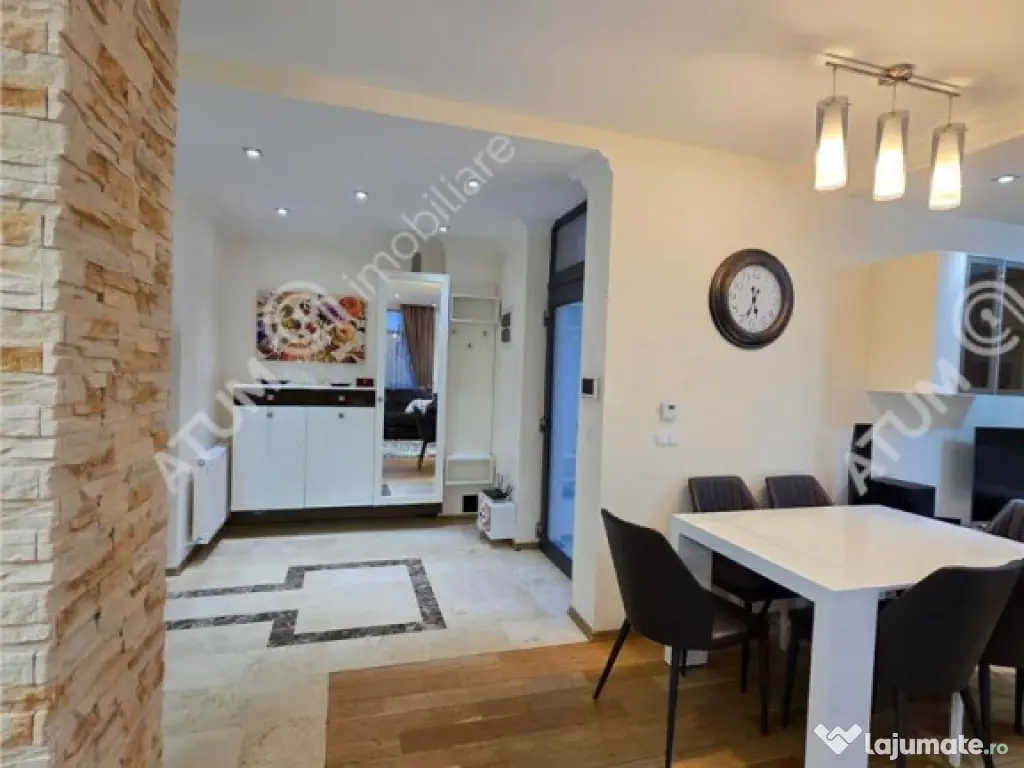 Casa 4 camere 3 bai terasa si teren 250 mp zona Octavian Gog 