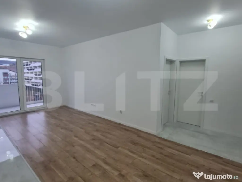 Apartament cu 2 camere, finisaje noi, terasa, parcare subter 
