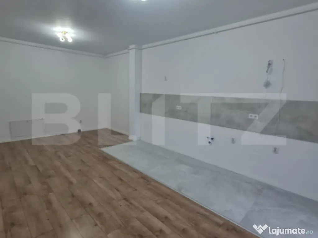 Apartament cu 2 camere, finisaje noi, terasa, parcare subter 