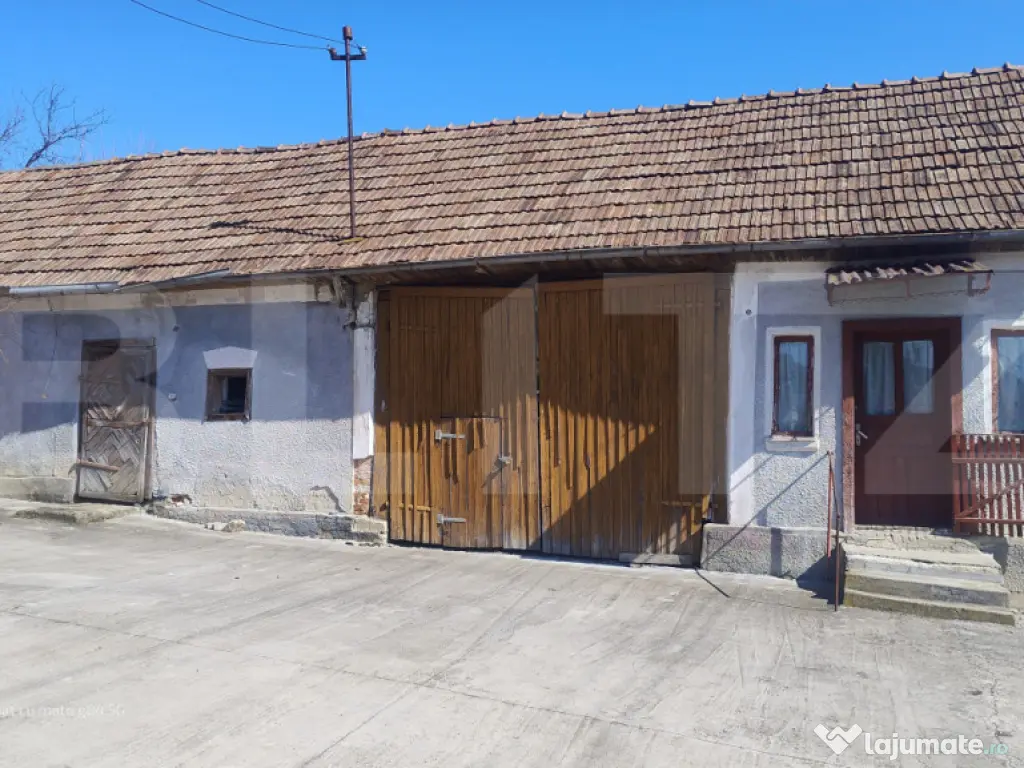 Casă spațioasă cu teren generos de 1447 mp în Șomcutu M 