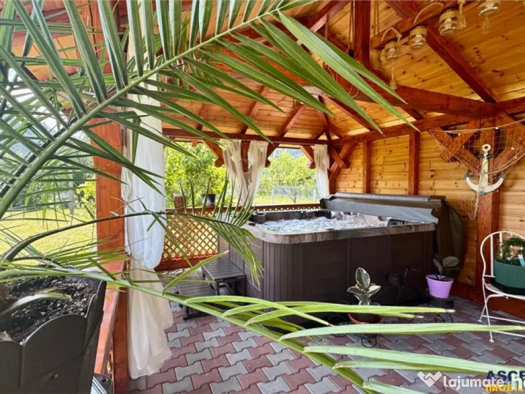 Refugiu pretios:jacuzzi, lemn masiv,2.000 mp teren,4 dormito 