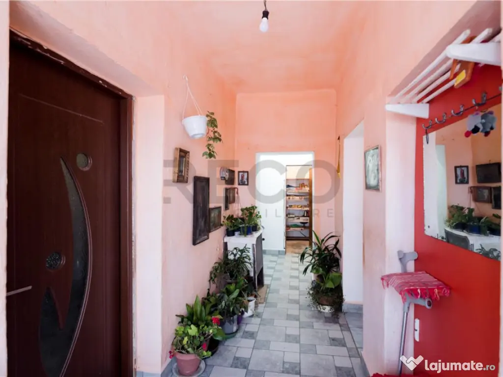 RECO teren cu casa de vaioaga 