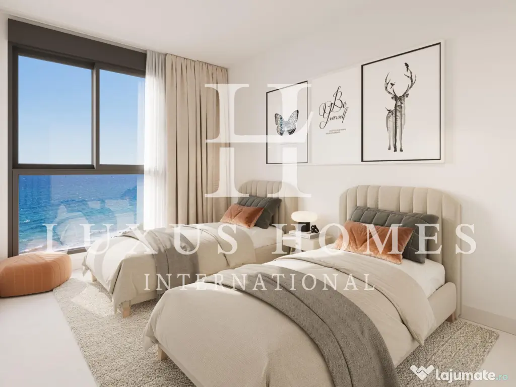 Casă cu terase cu vedere spre mare și grădini, situată într-un cadru liniștit 