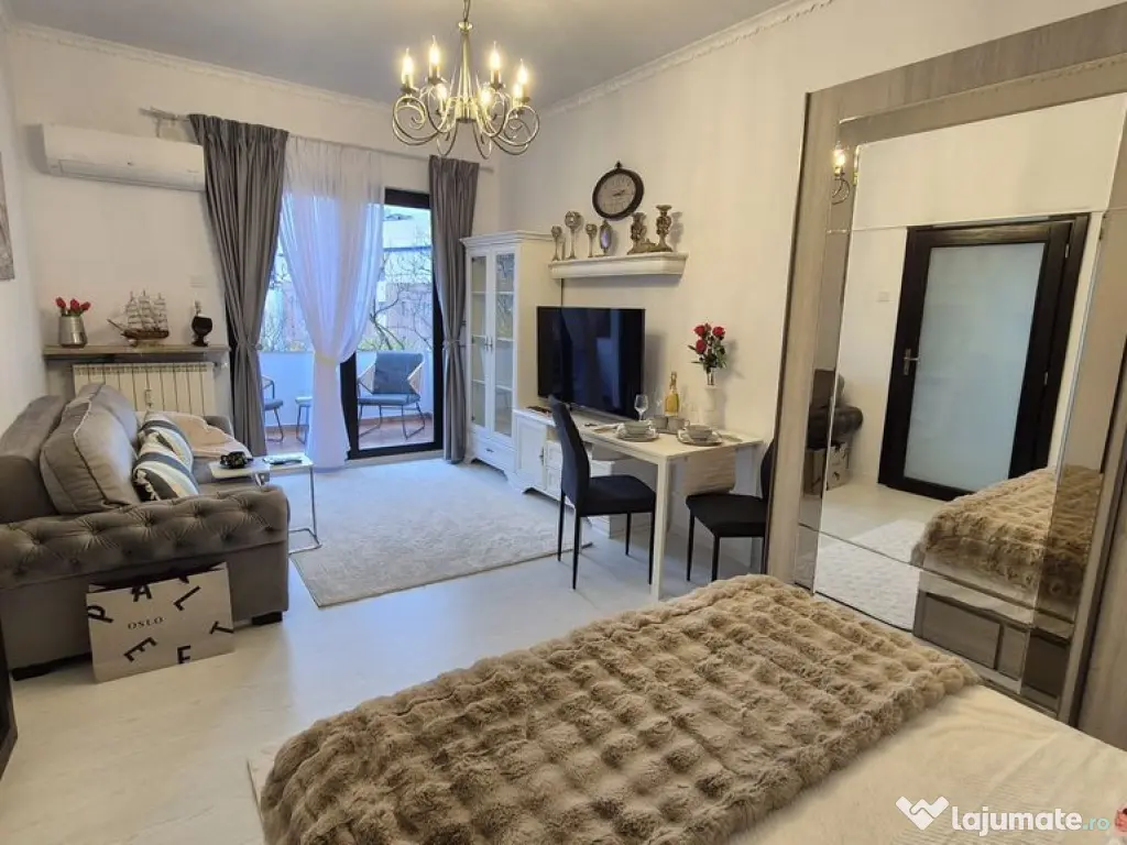 Garsonieră Modernă și Elegantă - Magheru - Romana 