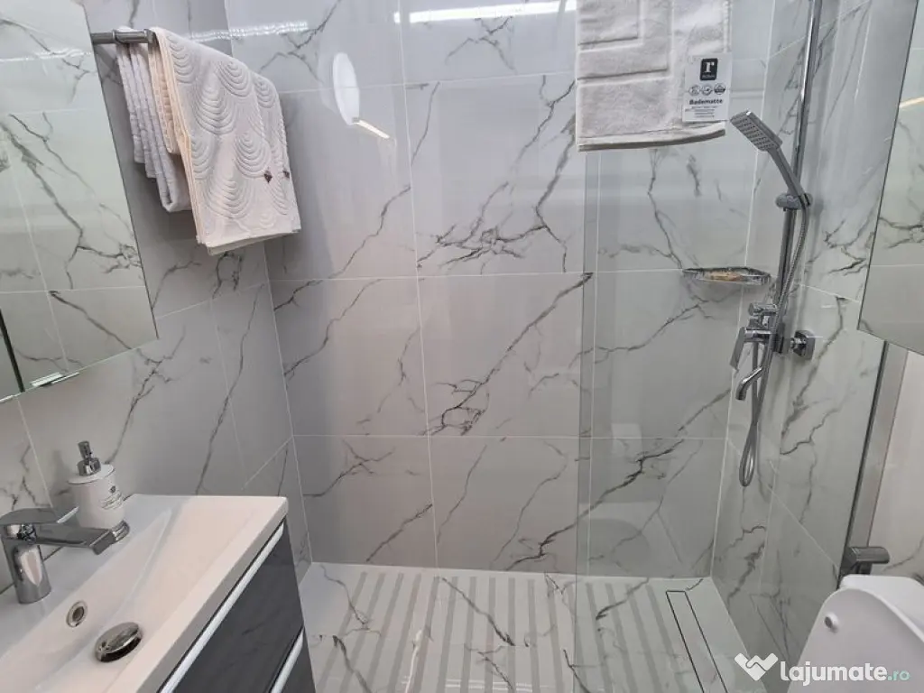 Garsonieră Modernă și Elegantă - Magheru - Romana 