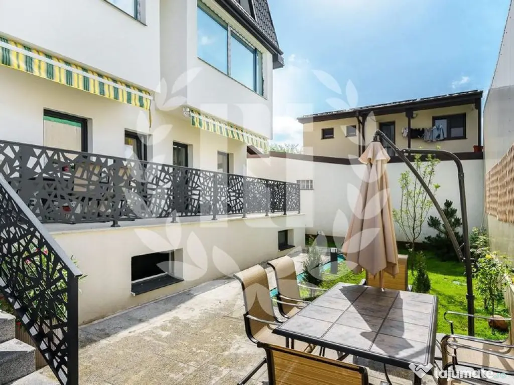 Apartament 4 camere cu terasă și curte generoasă 
