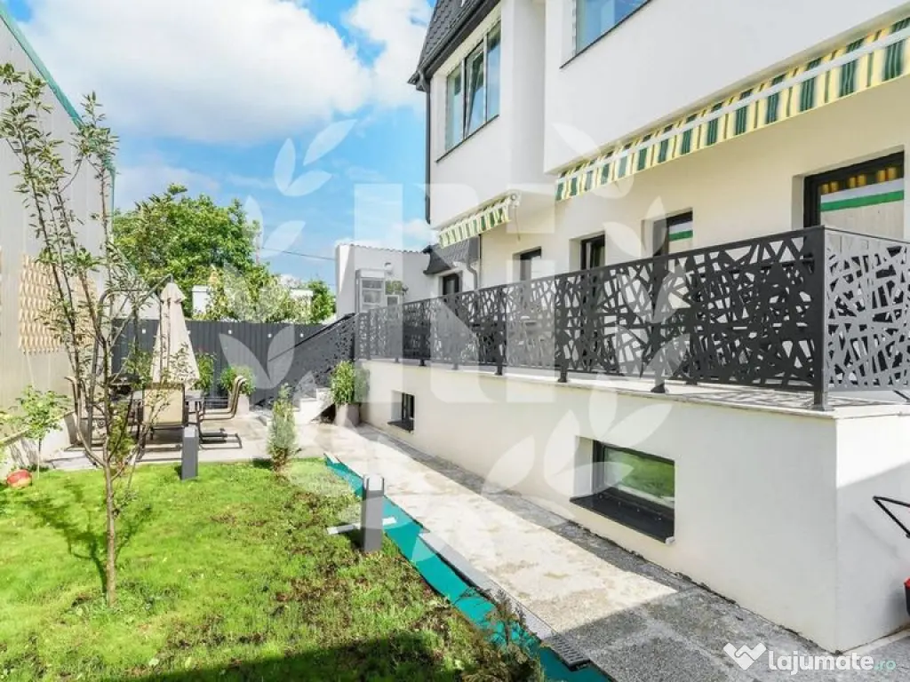 Apartament 4 camere cu terasă și curte generoasă 