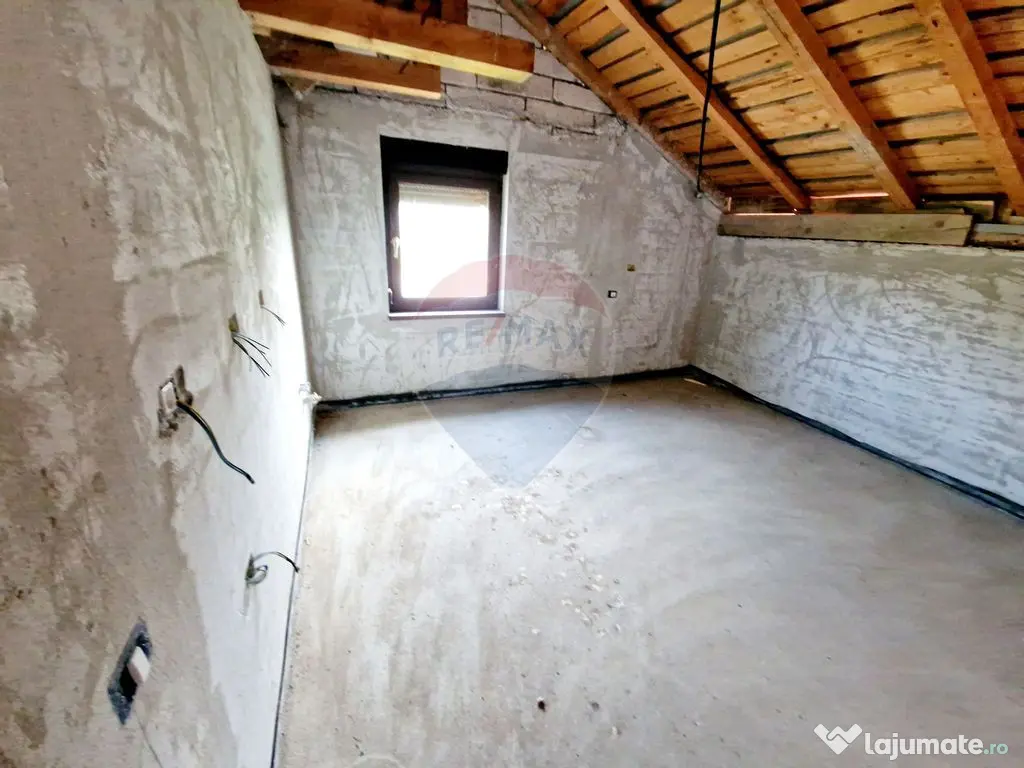 Casă spațioasă S+P+1E+M și teren generos 1664 mp