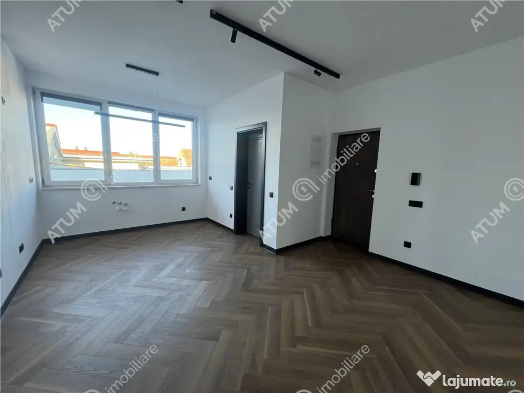 Apartament de 3 camere etajul 1 cu 2 locuri de parcare zona 