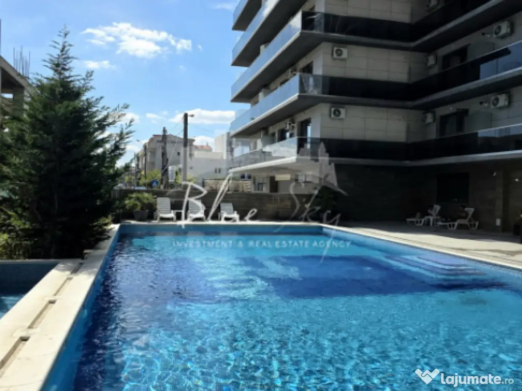 Apartament modern cu balcon generos și acces la piscină 