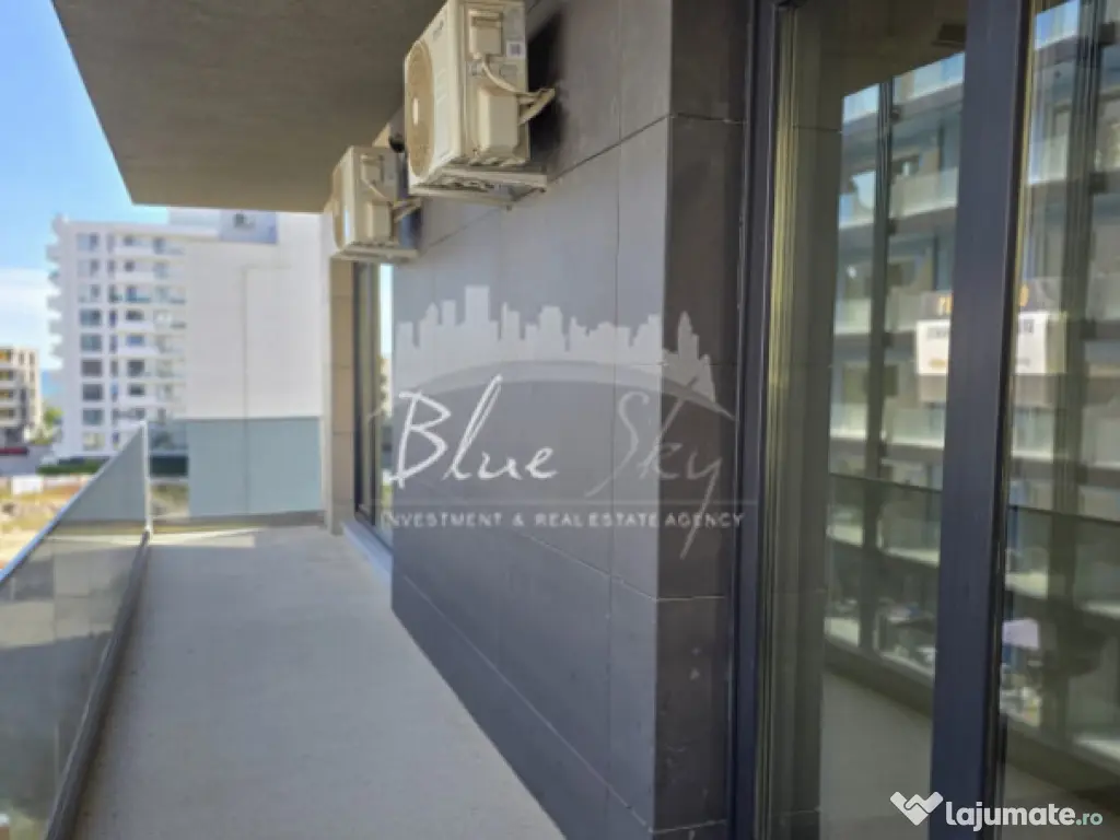 Apartament modern cu balcon generos și acces la piscină 