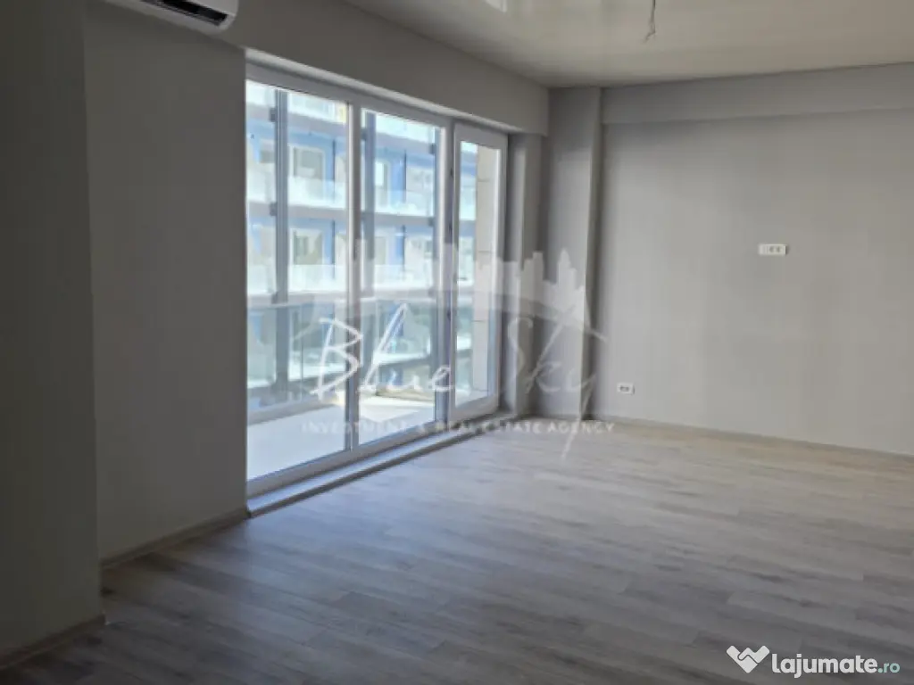 Apartament modern cu balcon generos și acces la piscină 