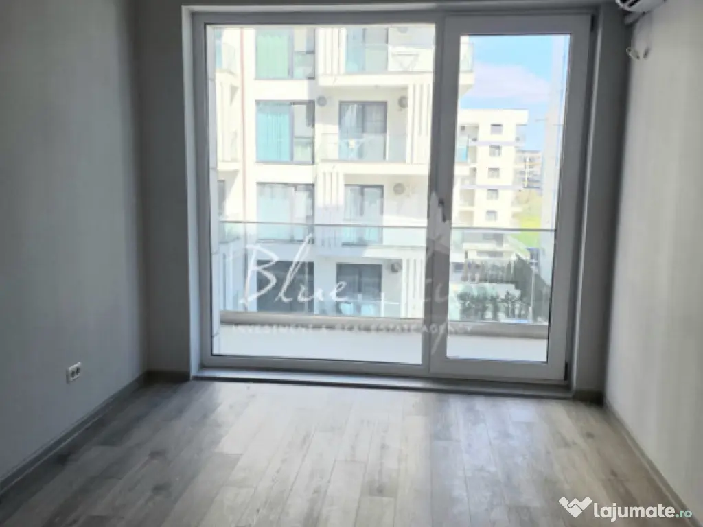 Apartament modern cu balcon generos și acces la piscină 