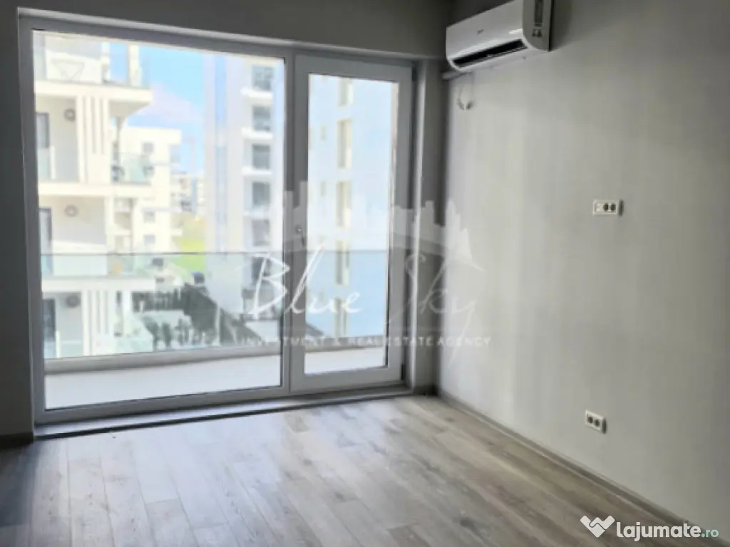 Apartament modern cu balcon generos și acces la piscină 