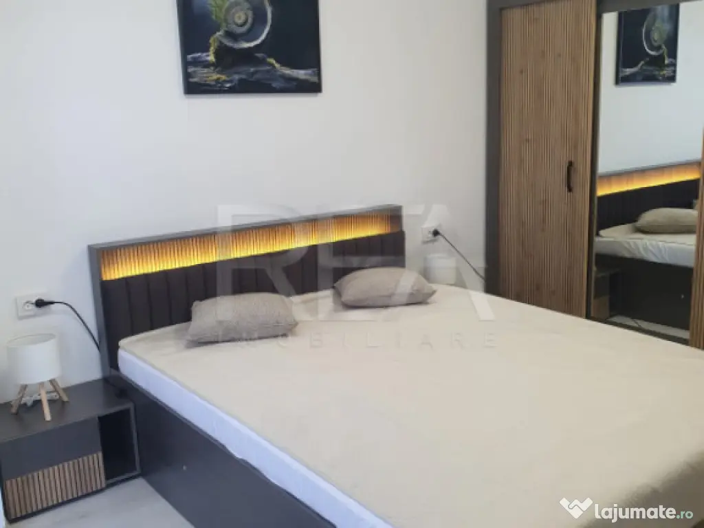 Apartament cu 2 camere, parcare privată și acces la piscin 