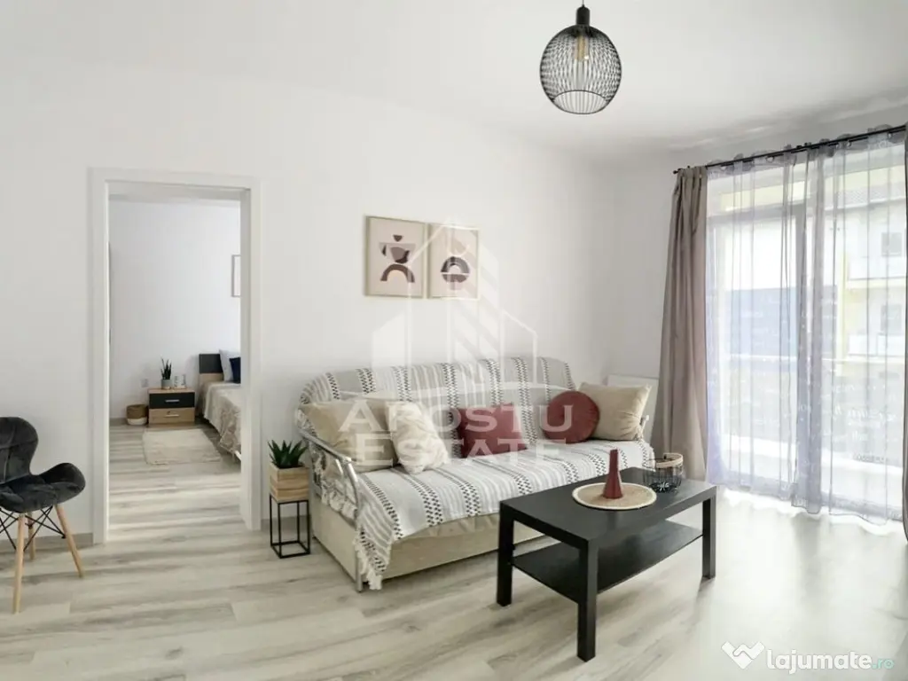 Apartament cu 2 camere complet mobilat si utilat la etaju... 