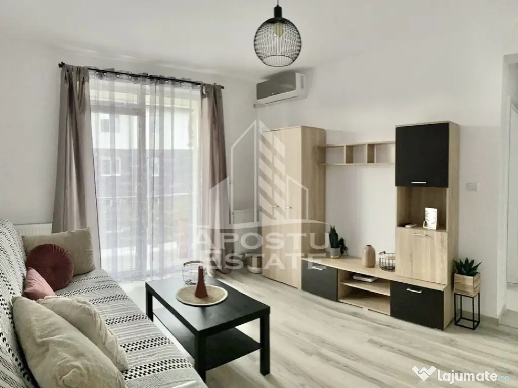 Apartament cu 2 camere complet mobilat si utilat la etaju... 