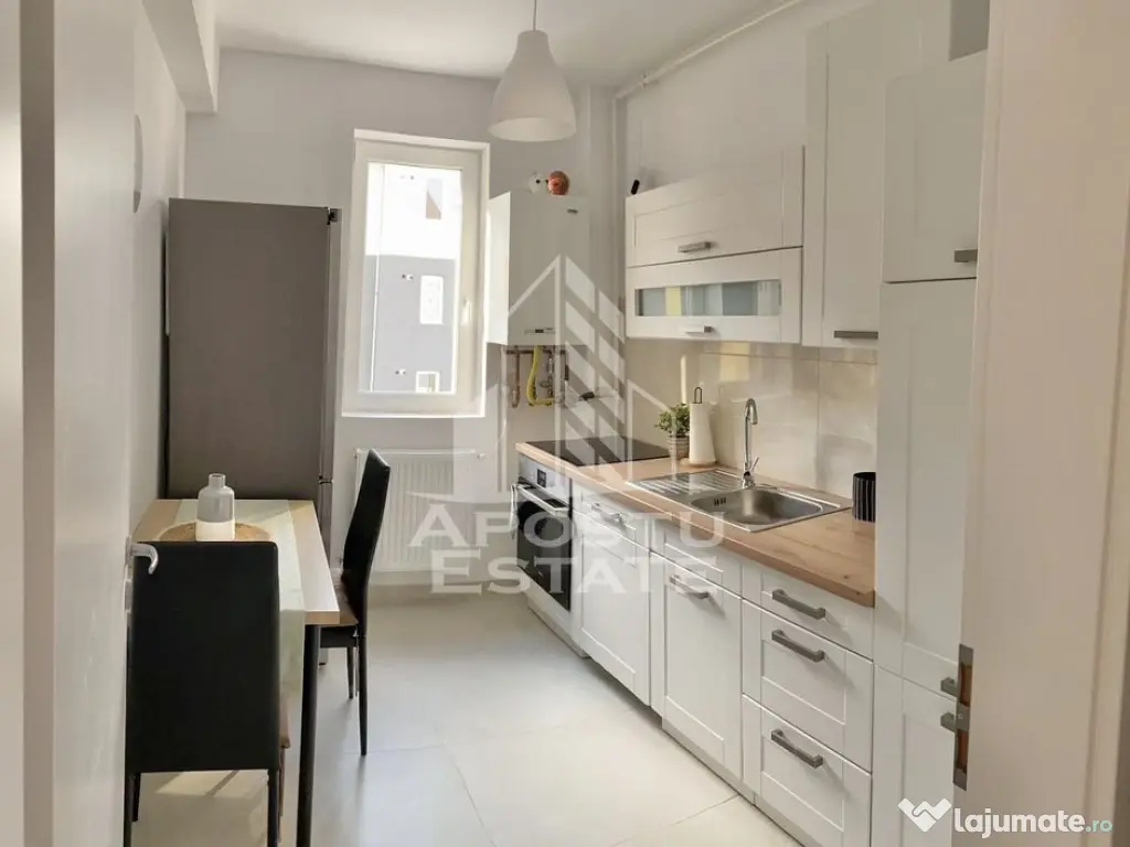 Apartament cu 2 camere complet mobilat si utilat la etaju... 