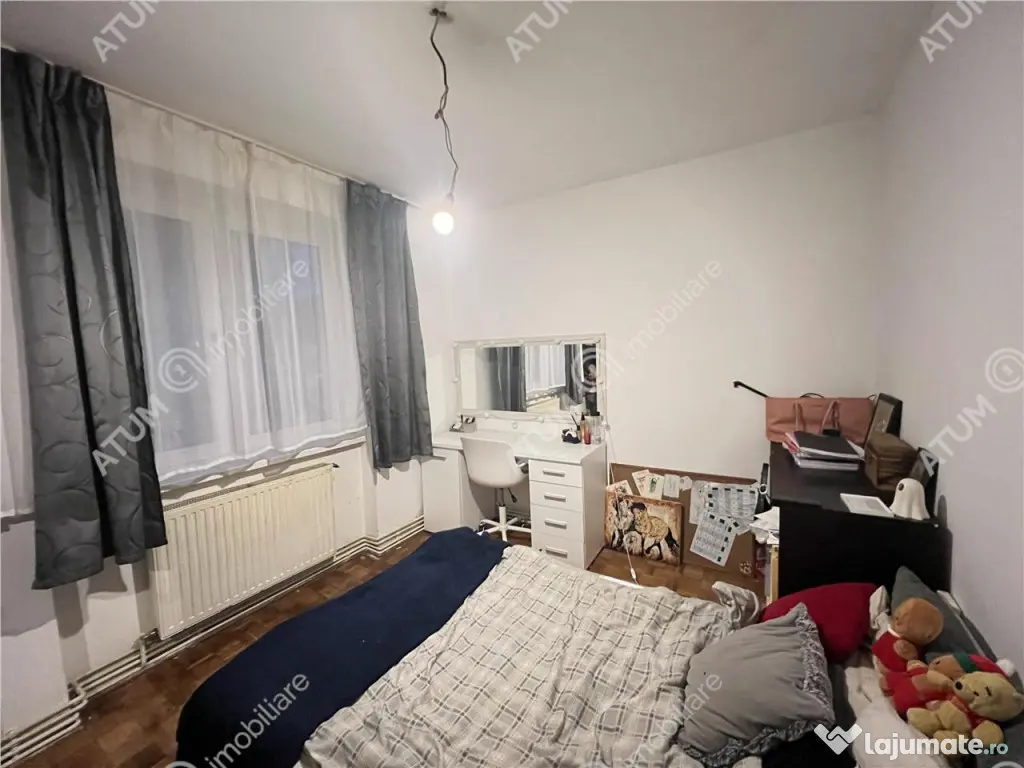 Apartament cu 4 camere 2 bai si balcon etaj 1 zona Rahovei d