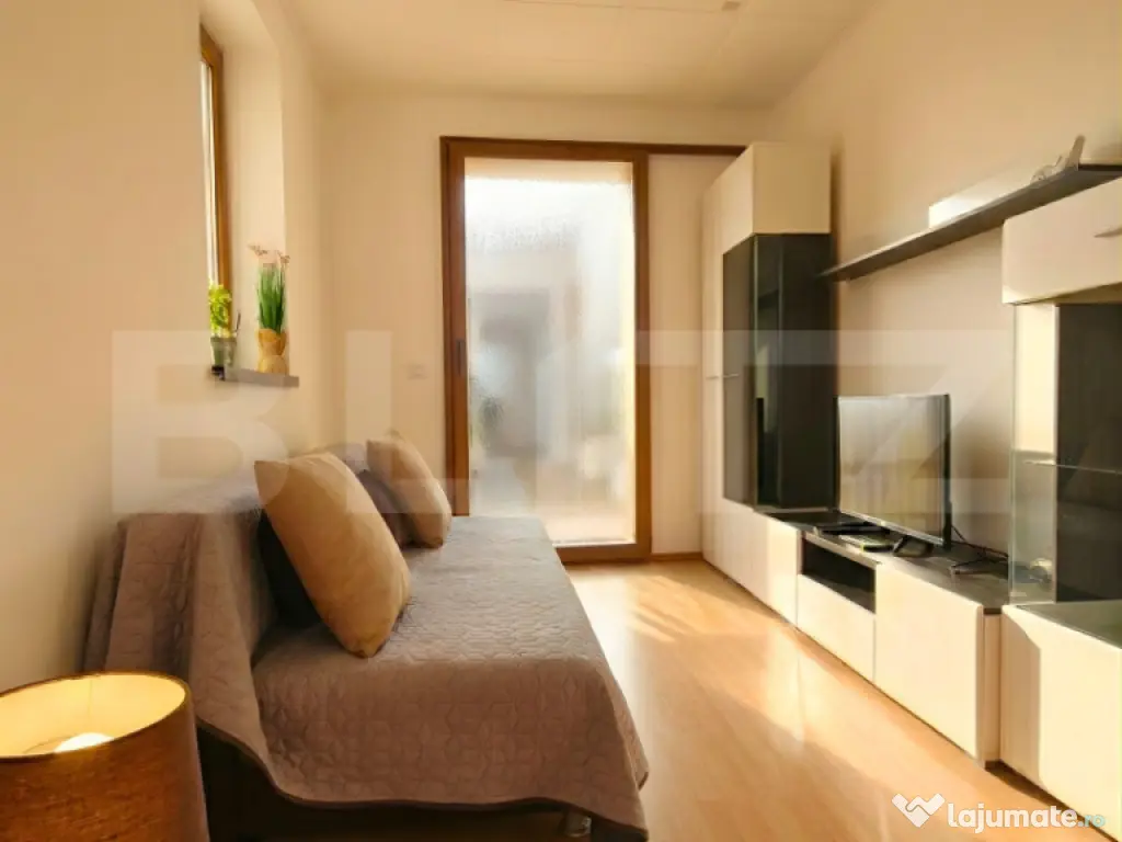 Apartament 2 camere cu curte privată și garaj subteran – 