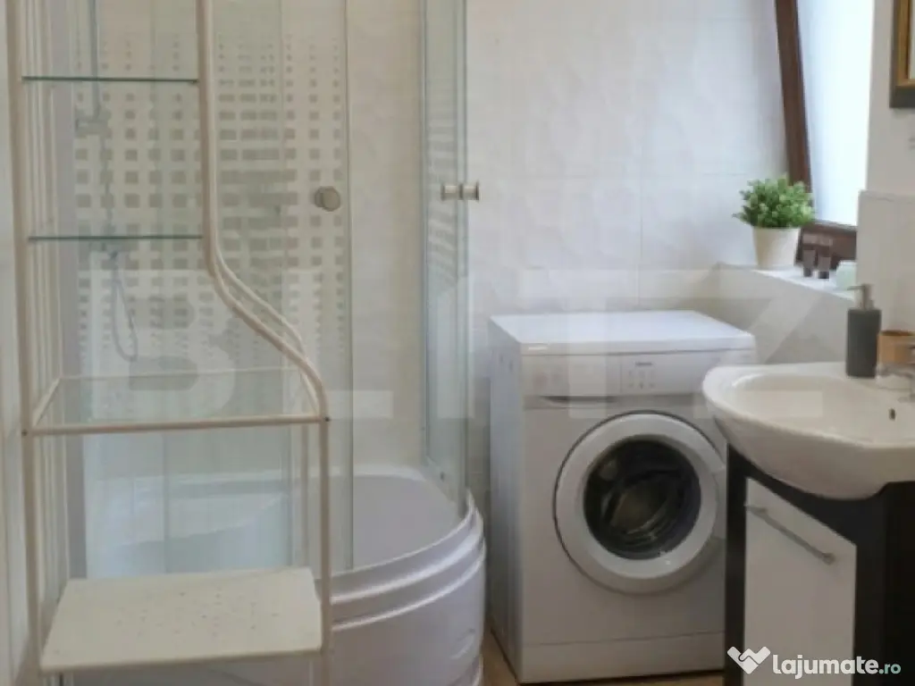 Apartament 2 camere cu curte privată și garaj subteran – 