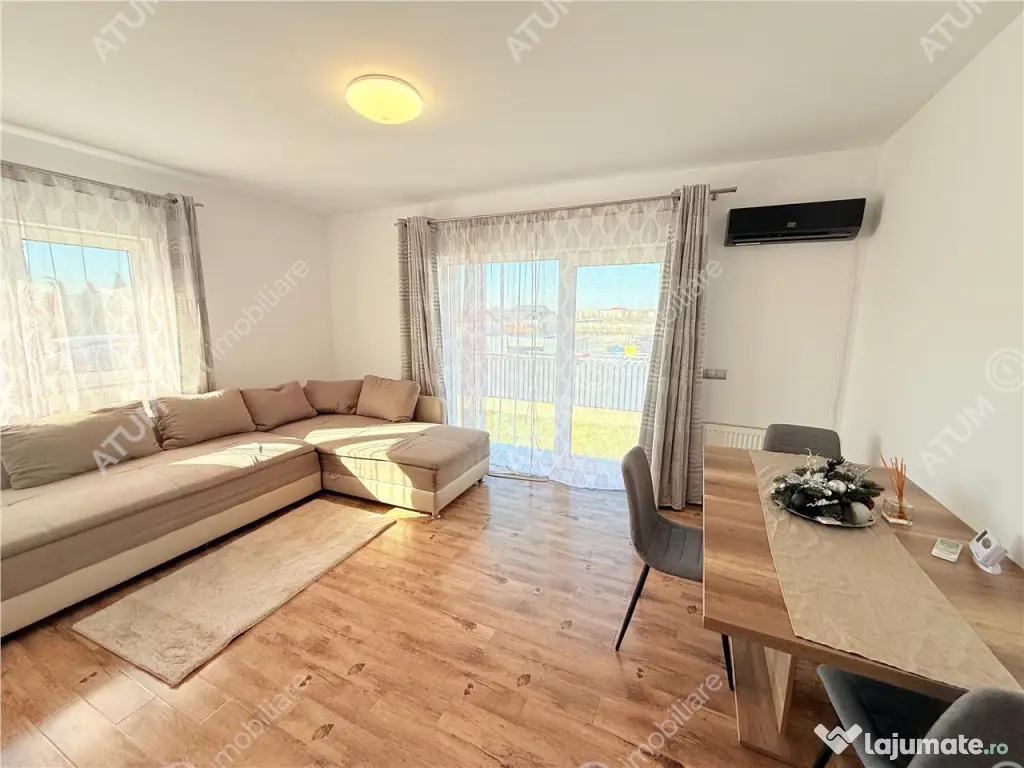 Apartament cu 2 camere decomandate la cheie si 120 mp gradin