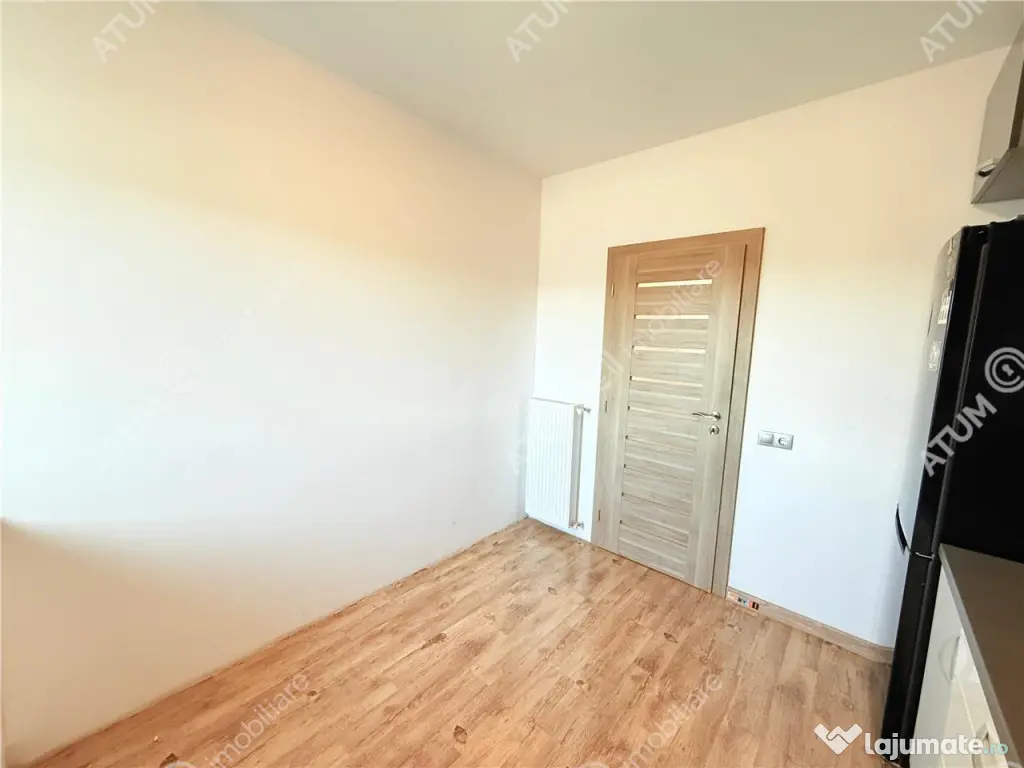Apartament cu 2 camere decomandate la cheie si 120 mp gradin
