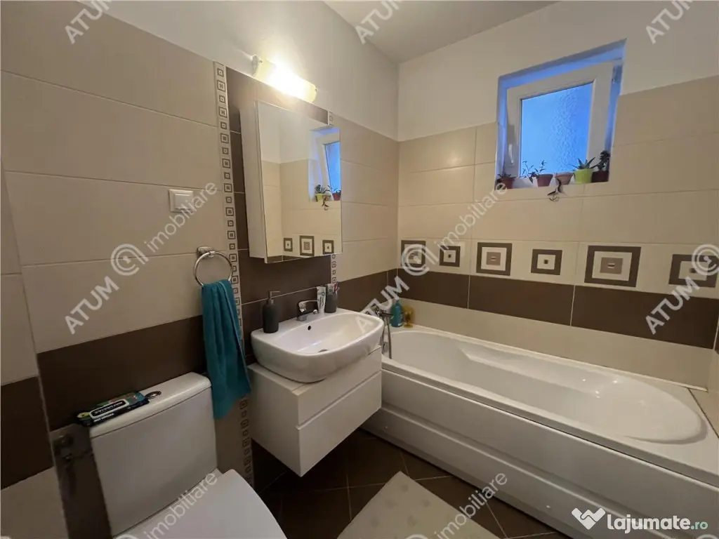 Apartament cu 3 camere 2 bai 2 balcoane etaj 2 zona Turnisor 