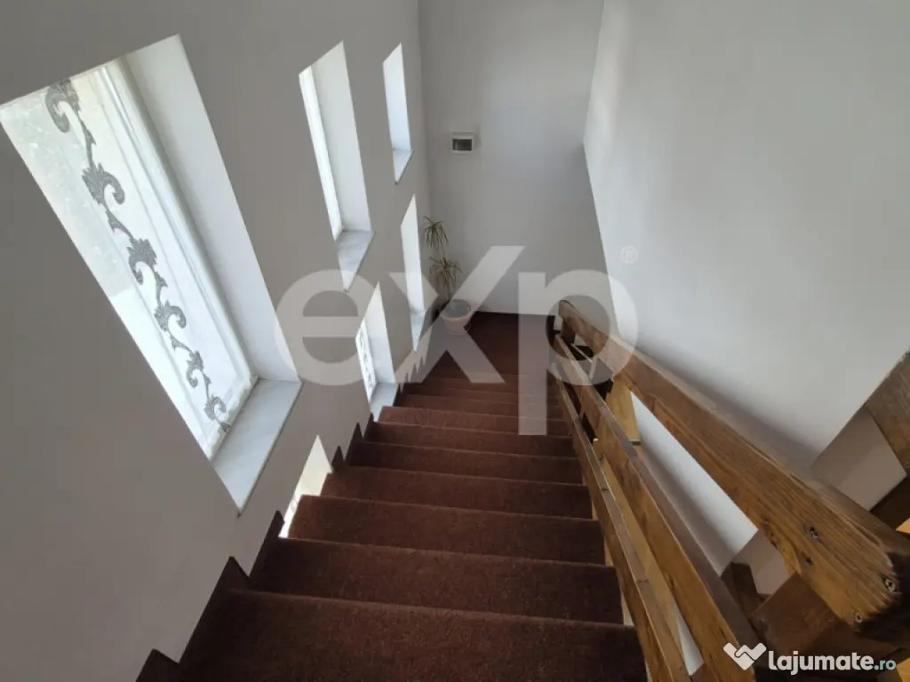 Casă mobilată, cu garaj și foișor – Zonă liniștită 