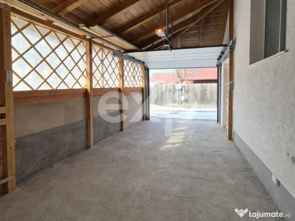 Casă mobilată, cu garaj și foișor – Zonă liniștită 