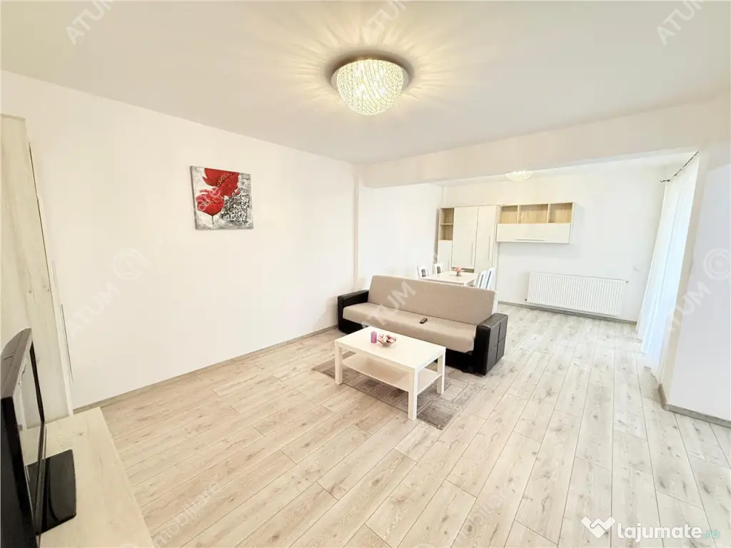 Apartament cu 2 camere 56 mp utili mobilat etaj 1 si loc de 